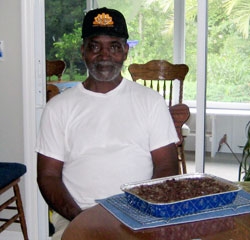 Dozier Hanberry with German Chocolate cake made from scratch with Tutor Judith Mathes.